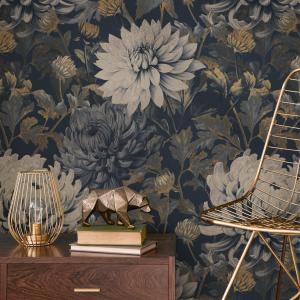 Vintage floral wallpaper with moody blooms in dark blue and gold by ONDECOR