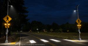 Solar-powered RRFB system with integrated crosswalk lighting. Nighttime rendering