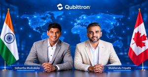 Sidhartha Mudrakola and Shubhendu Tripathi, co-founders of Qubittron, standing before a world map with the flags of India and Canada, representing the company's participation in the Team Canada Trade Mission to India.