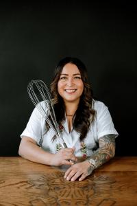 Pastry chef Grecia Ramos holding a whisk in San Antonio, Texas.