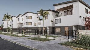 Architectural rendering of Akino Living's white and charcoal buildings, covered balconies, and clustered pedestrian entrances.