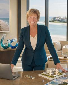 Jill Helgren, Florida real estate advisor with Coastal Properties Group International, in a waterfront office setting.