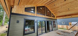 Exterior building-envelope upgrade and siding installation on an older King County home by Final Touch Construction.