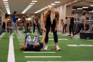 Group of women exercising on a training turf