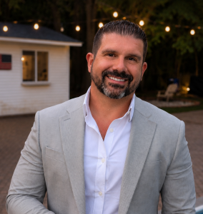 Professional headshot of Andrew Ragusa, Licensed New York Real Estate Broker and Broker of Record for REMI Realty LLC.