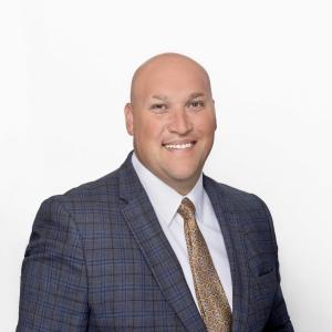 Headshot of Tom Luther, VP, CX & BPO Advisory at Outsource Consultants