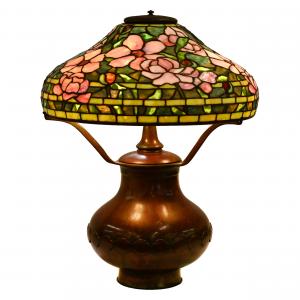 Tiffany Studios leaded glass table lamp with “Peony” pattern shade, boasting magnificent colors, mounted on the original bronze base, 23½ inches tall, a must-see. Estimate: $45,000-$65,000