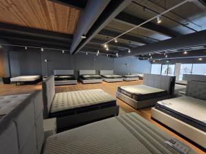 Inside the SleePare Seattle showroom at 5701 6th Ave S, Suite 133 in Georgetown, where shoppers can test ten online mattress brands in one visit