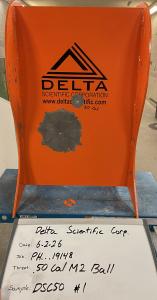 DSC50BR test barrier showing impact points from .30-06 armor-piercing and .50-caliber M2 Ball ammunition.