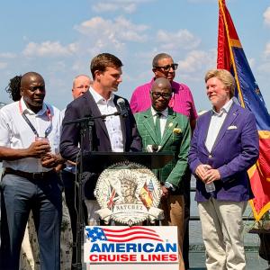 Podium: Charlie Robertson, President and CEO of American Cruise Lines Right: Dan M. Gibson, Mayor of Natchez with Mayors of the Mississippi River cities.