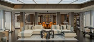 Ruang keluarga Regent Seven Seas Prestige Skyview Suite yang dilengkapi langit-langit kaca, menghadirkan pemandangan langit yang memukau.