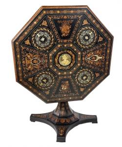 Octagonal Italian Renaissance Revival ebonized-wood center table closely related to the work of Florentine cabinetmakers Luigi and Angiolo Falcini, inlaid in varied fruitwoods. Estimate: $2,000-$3,000