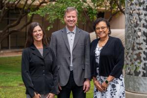 Principal Investigators for the NIH Grant to TTUHSC Julie St. John, Lance R. McMahon, and Naima Moustaid-Moussa standing outside together.