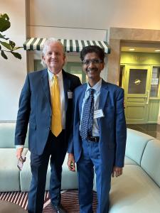 Hiten Bhuta standing with an international business professional at the European Expansion Strategies event in Atlanta.