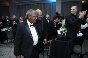 Dr. Eromo Kelbisow, for whom the Dr. Eromo Kelbisow Prize for Humanitarian Leadership is named, with his son Dr. Ersno Eromo at the inaugural Illuminate Life Gala, 2024.
