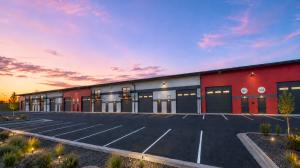 Exterior of a micro-bay flex building with sunset in the background