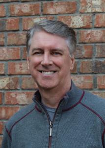 Headshot of Stuart Frost, Founder and CEO of Geminos Software