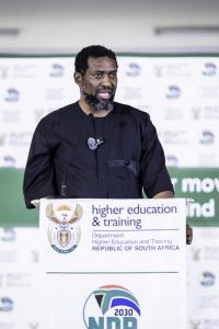 The Minister of Higher Education and Training, Mr. Buti Manamela addressing learners and dignitaries at the launch of the 4th Heritage Skills Expo in Mankwe, North West Province