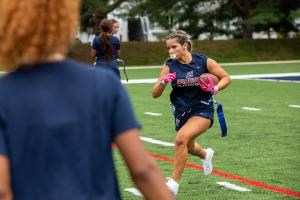 Flag football player running