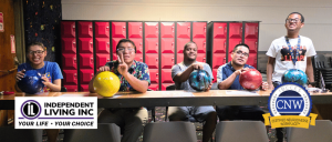 Five people pose with colorful bowling balls in front of red lockers, with Independent Living Inc. and CNW logos overlaid.