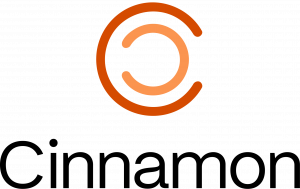 Cinnamon company logo featuring two nested, circular orange "C" shapes above the word "Cinnamon" in a black sans-serif font