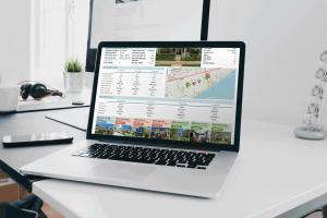 laptop with CMAsnap report in a desk in a clean uncluttered home