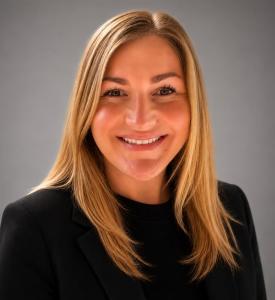 Headshot of Kayla Pollak, VP of Growth at Rockstar Global