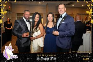 This photo shows Anthony Caputo and Gregory Guenther from GRANTvest Financial Group at the Butterfly Ball to support Liv Like a Unicorn