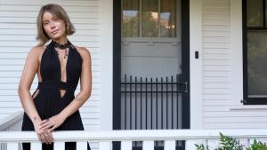 Morgan Perry Posing on a Porch (Courtesy Morgan Perry)