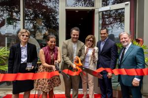 Coral Gables Mayor Vince Lago, Vice Mayor Rhonda Anderson and guests cut a red ribbon outside Maison Mischief at 361 Miracle Mile to open Day of Design.