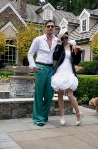 Models Devin Short and Kosin Chen posing in front of Dan and Laurie Ivanoff's Sammamish estate house