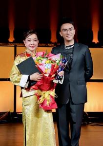 Eric HZ and Liu Xiaoqing at a Chinese-American cultural exchange Lantern Festival gala in 2025.