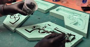 Pouring resin into custom mold for Barcade Quick and Crash controller