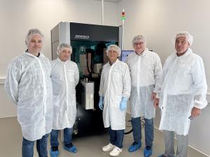 FiberSense executives in front of the new fiber filling machine
