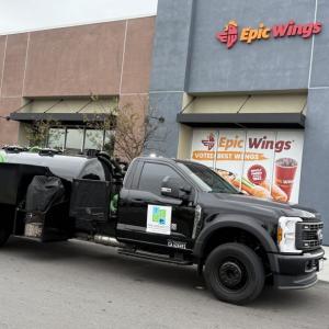 Grease trap pumping truck serving commercial kitchens across Los Angeles