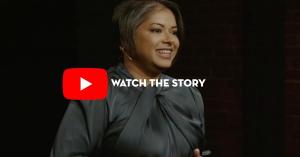 Shannon Fernando-Rubera speaking on the TEDx stage during “The Permission Principle,” with a “Watch the Story” video link.
