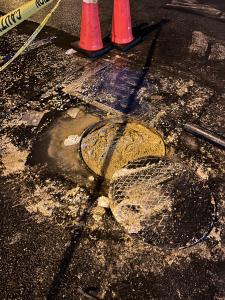 Indoor overflowing grease trap at a Los Angeles restaurant
