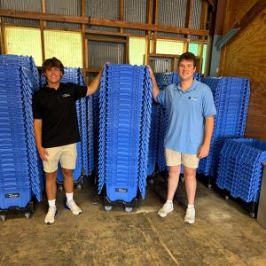 Evan Scearce and Hudson Williams with RVATotes reusable moving totes