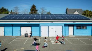 Children playing in front of an East Oakland after-school program, one of many community orgs RE-volv has worked with