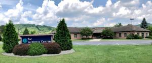 Exterior of The Guidance Center’s Bradford facility, with its sign in front of a one-story brick building.