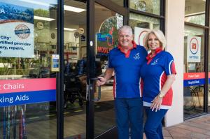 Photo of Founders Diane and Vinny Baratta welcoming you to enter the Mobility City of Boca Raton Showroom