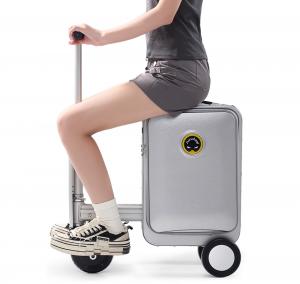 Airwheel SE3SL 20-inch smart electric rideable cabin suitcase, user riding the luggage outdoors