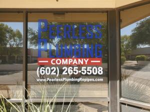 Peerless Plumbing Office and Logo