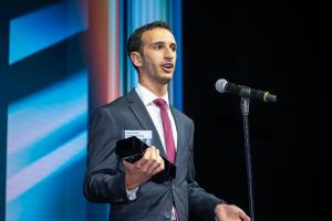 Aidan Vrobel accepts award for Cableteque