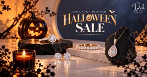 Dvik Jewels Lab Grown Diamond Halloween Sale jewelry including diamond rings, stud earrings, eternity band, and teardrop necklace displayed with a carved pumpkin and candle
