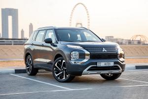 Car stand on dubai city