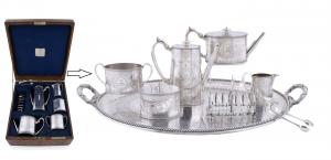 7-piece English sterling silver coffee and tea service with silver-plated tray, made circa 1856 by Alexander Macrae of London and retailed by Hunt & Roskell. Estimate: $10,000-$12,000