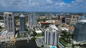 Aerial view of downtown West Palm Beach, Florida, showing luxury high-rise residences, waterfront development and the city skyline.