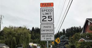 speed Limit sign with photo enforced and Park on it