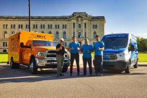 Z-Best founder Dave Ramsbottom (left) with the Nikbakht family at the Saskatchewan Legislative Building in Regina.